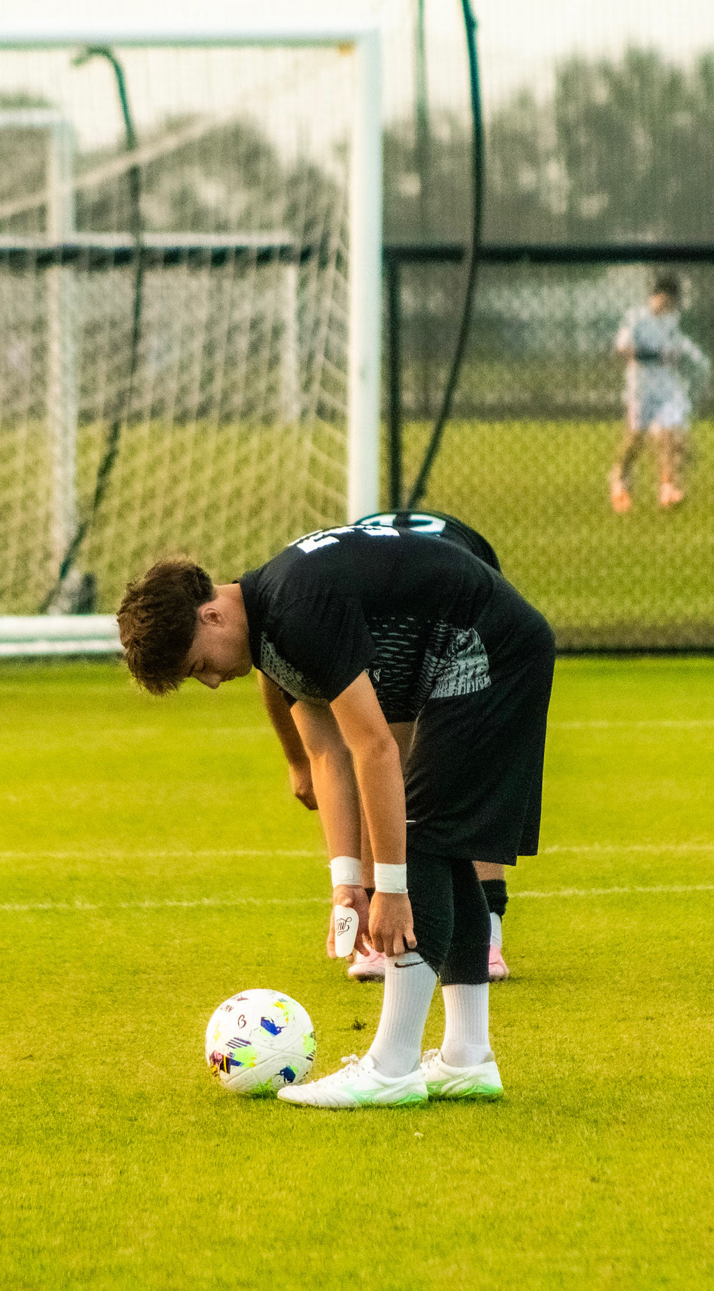 White Invictus Logo Mini Shin Guards